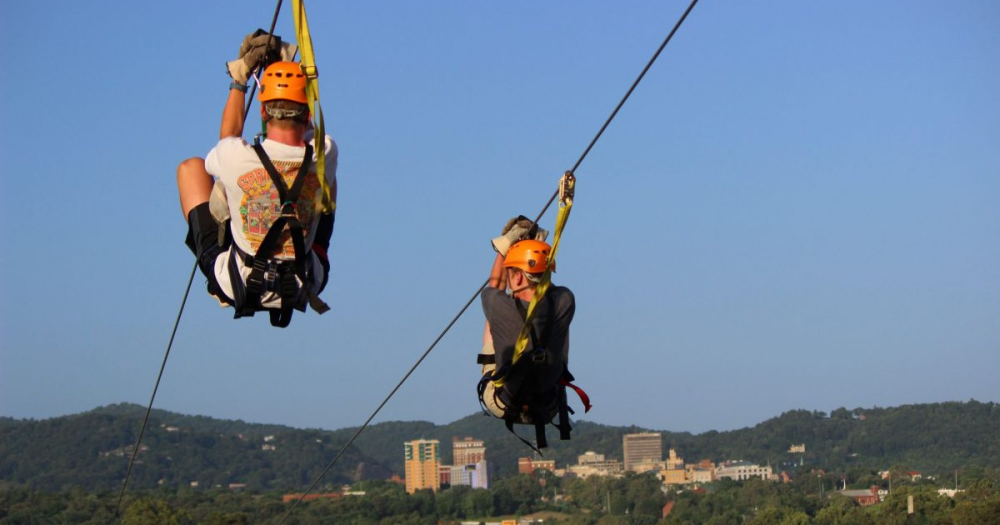 two people ziplining